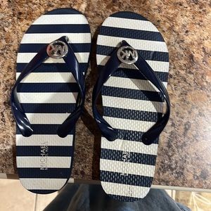 MK flip flops.